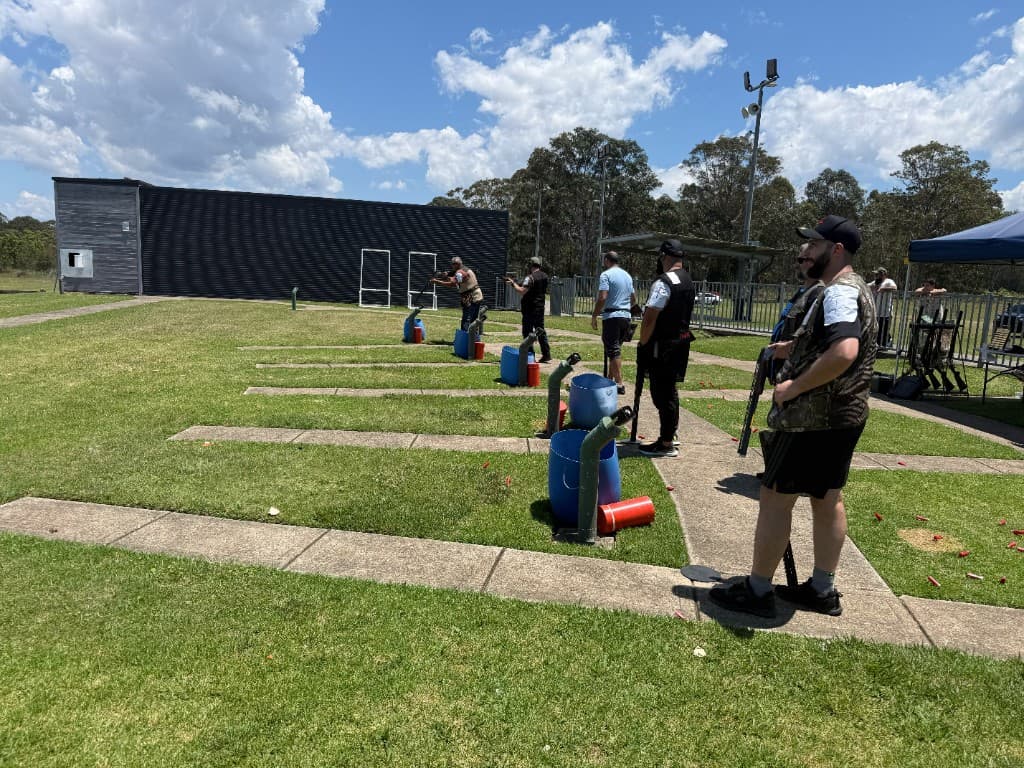 Members competing at an outdoor clay target shooting range