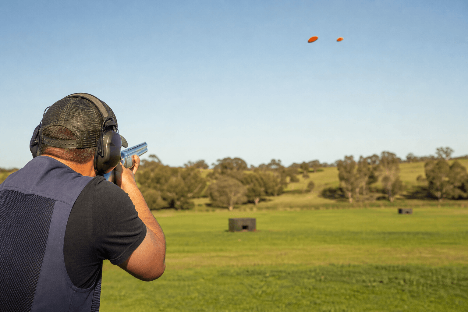 Members at an outdoor clay target shooting range